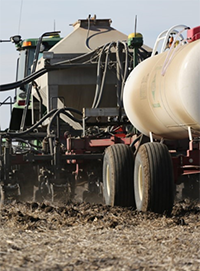 nitrogen stabilizer fertilizer application on field image